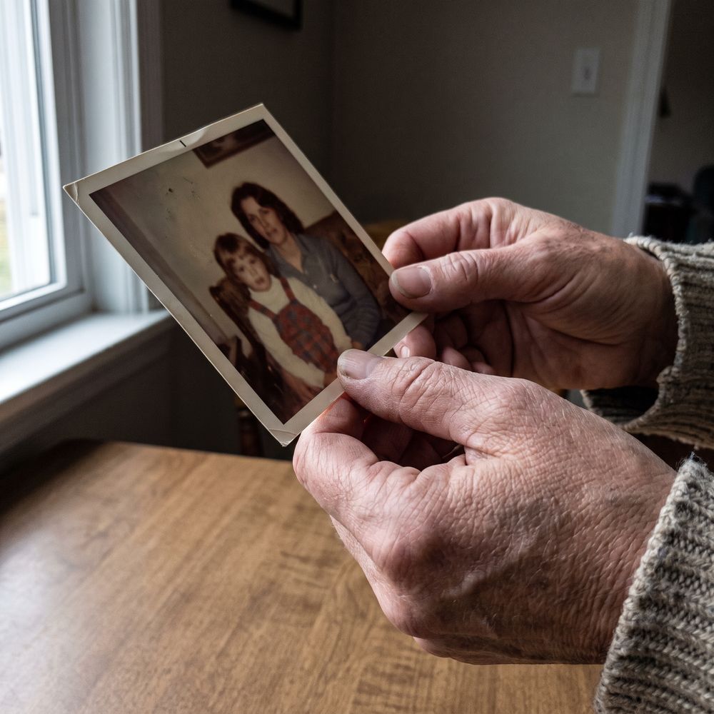 The photograph I keep on the table. My thumb is always over the same corner.